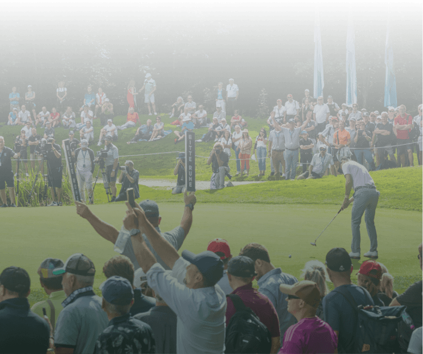Spectators around the green