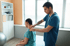 Physiotherapist treating patient for bulging or herniated discs