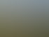Drohnenansicht eines modernen Campus mit weißen Gebäuden, umgeben von grünen und herbstlich gefärbten Bäumen.