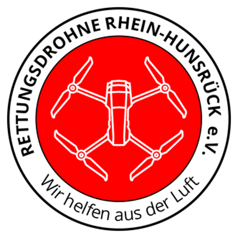 Rundes Logo "Rettungsdrohne Rhein-Hunsrück e.V. Wir helfen aus der Luft" mit weißer Drohnen-Skizze auf rotem Grund.