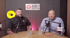 Two men, one bald with glasses, one with dark hair, sit at a table with microphones, "Ask the Surveyor" logo behind them.