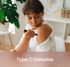 Young woman checking blood sugar level at home as part of type 2 diabetes management with functional medicine.