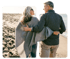 Older couple enjoying pain relief and regenerative wellness by the beach