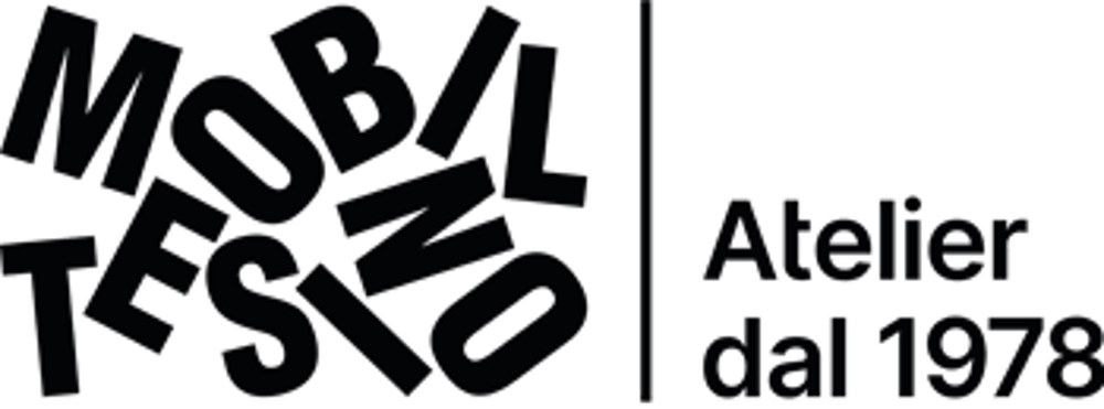 Logo mit "MOBILTESINO" in unregelmäßigen Buchstaben und "Atelier dal 1978" rechts.