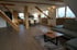 zentraler  Wohnbereich der Ferienwohnung Denkpause mit modernem Design und gemütlicher Atmosphäre