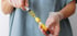 Hands with syringe handling fluids, for sciatica pain treatment