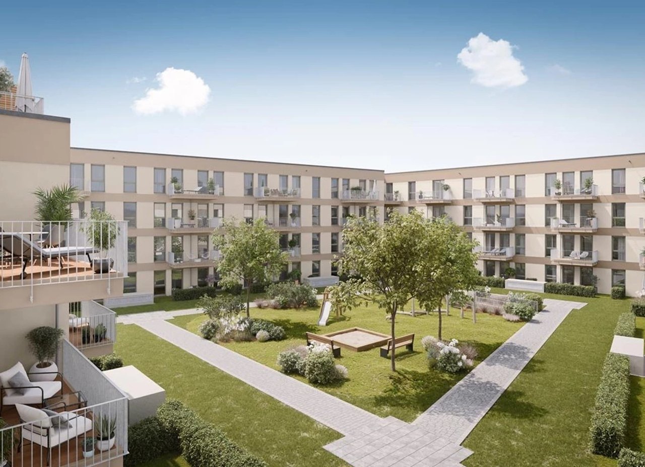 Bergfelde Living – begrünter Innenhof mit Spielplatz