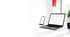 Laptop mit Dashboard-Software, die Datenvisualisierungen für Umsatz, Besucher und Bestellungen anzeigt.