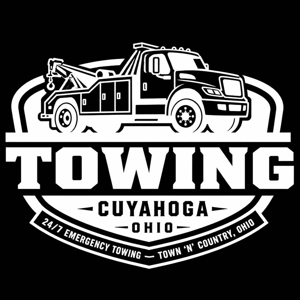 White tow truck logo with "TOWING CUYAHOGA OHIO" and "24/7 EMERGENCY TOWING - TOWN 'N' COUNTRY, OHIO".