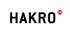 Schwarzer HAKRO-Schriftzug mit rotem X-förmigem Logo in einem Kreis.
