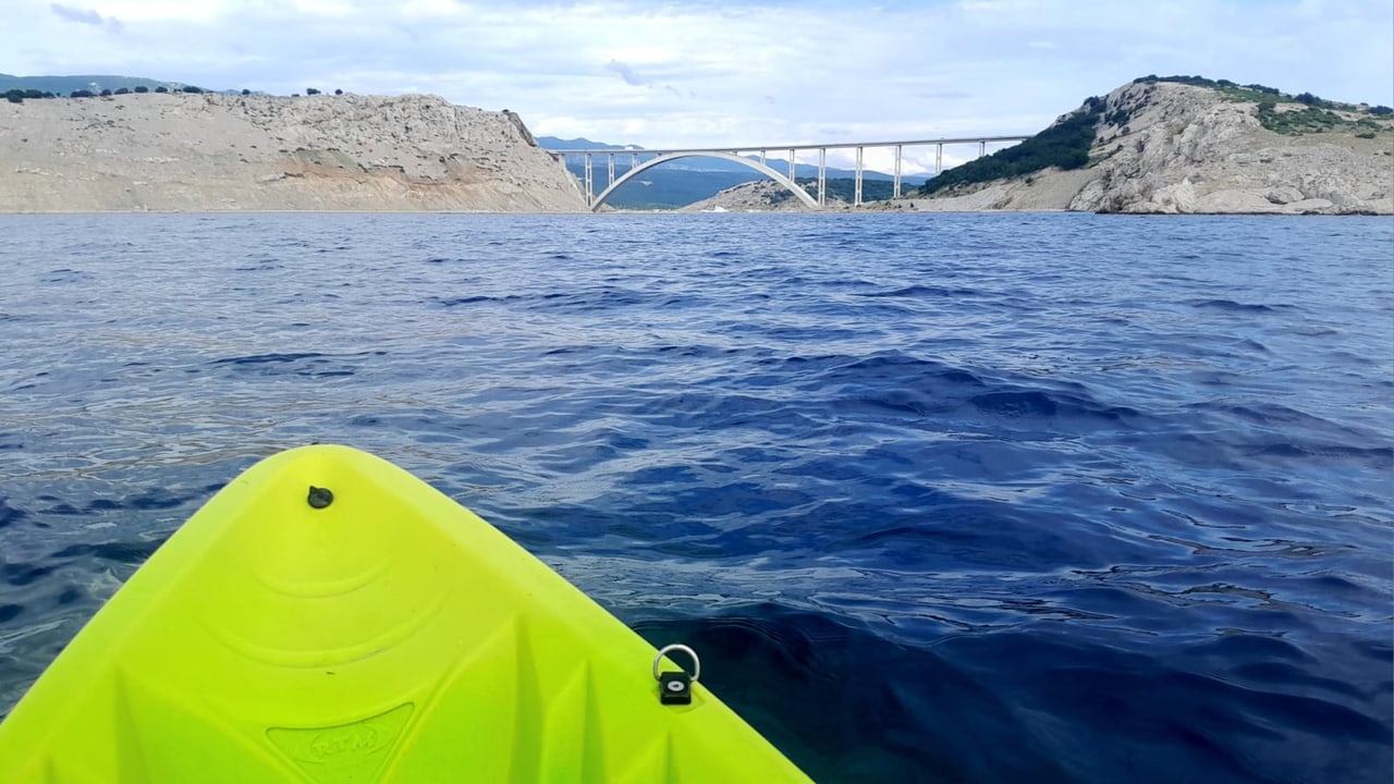 View from a kayak across the bay towards the bridge