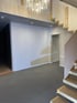 Moderner Innenraum im Rohbau mit grauem Designboden im Raum Aalen
