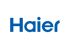 Blauer "Haier"-Schriftzug auf dunkelgrünem Hintergrund.