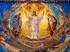 Mosaic of the Transfiguration of Jesus with Moses and Elijah on a golden background, surrounded by disciples.