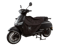 Black electric scooter with a black leg cover, Next logo visible on the cover.