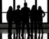 Silhouetten des SOS-Teams vor hellem Fenster – stehen symbolisch für den Start in die digitale Transformation mit SOS: ein gemeinsamer Weg zu effizienteren Prozessen und zukunftsfähigen Lösungen für mittelst�ändische Unternehmen.