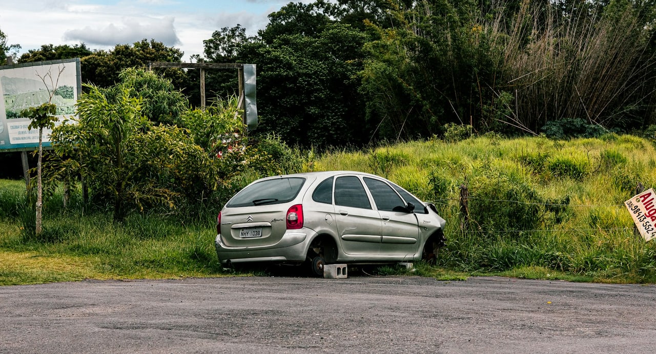 Disabled car stopped at the roadside, the situation drivers face after a car accident in California near Hanford