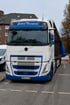 Fünf weiße Lastwagen der Firma „Kelle“ mit blauen Sternen