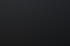 Hochwertiges, dunkles Website-Design auf einem Monitor