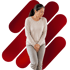 Woman with hands clasped between her legs, feeling discomfort because of bladder leakage.