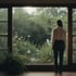 Person am Fenster