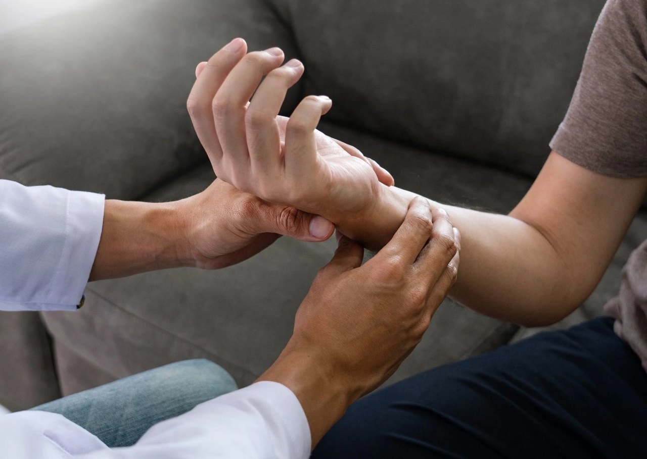 Hands-on wrist therapy session