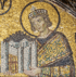 Byzantine mosaic of Emperor Constantine in a gold halo, holding a model of a city.