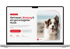 Laptop zeigt Website für Hundetraining mit Foto eines Border Collies und Text „Vertrauen, Bindung & ein gut erzogener Hund“.