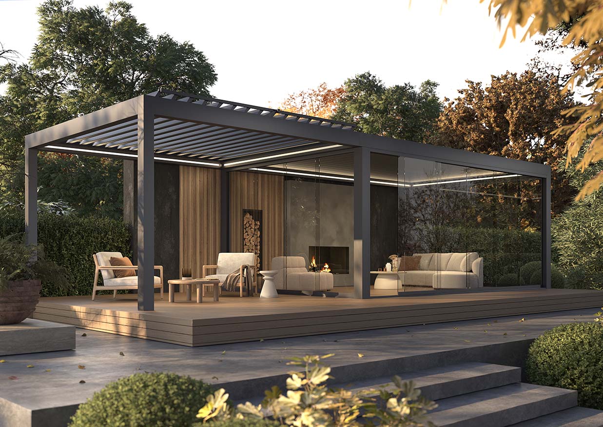 Terrassenüberdachung mit Aluminium-Lamellendach am Abend