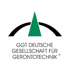 Logo der GGT Deutsche Gesellschaft für Gerontotechnik mit schwarzem Bogen und grünem Dreieck.