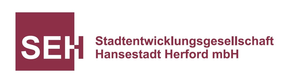 Logo: SEH Stadtentwicklungsgesellschaft Hansestadt Herford mbH.