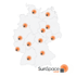 Karte von Deutschland mit 12 orangefarbenen Kreisen, die Solarpanels an verschiedenen Standorten zeigen. SunSpace solar Logo.