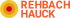 Logo der Firma Rehbach Hauck mit dem Schriftzug in Orange und einer Zielscheibe aus gelben, orangen und roten Kreisen.