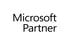 Schwarzer Schriftzug Microsoft Partner auf weißem Hintergrund.