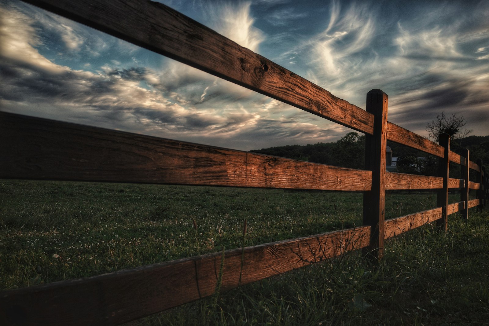 Wooden fence beside a green lawn in Columbia, Maryland