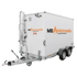 Weißer mobiler Heizkessel auf Anhänger mit Schornstein und "MB Heizmobile 24H" Logo.