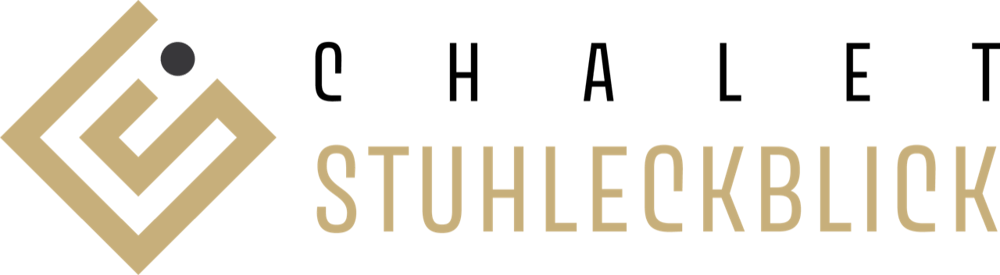 Goldenes Logo mit CHALET in weiß und STUHLECKBLICK in Gold auf dunklem Hintergrund.