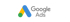 Google Ads Logo mit dem farbigen A-Symbol in Blau, Gelb und Grün vor schwarzem Hintergrund.