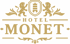 Grünes Logo des Hotels Monet auf beigem Hintergrund mit Löwen, Schild und Krone.