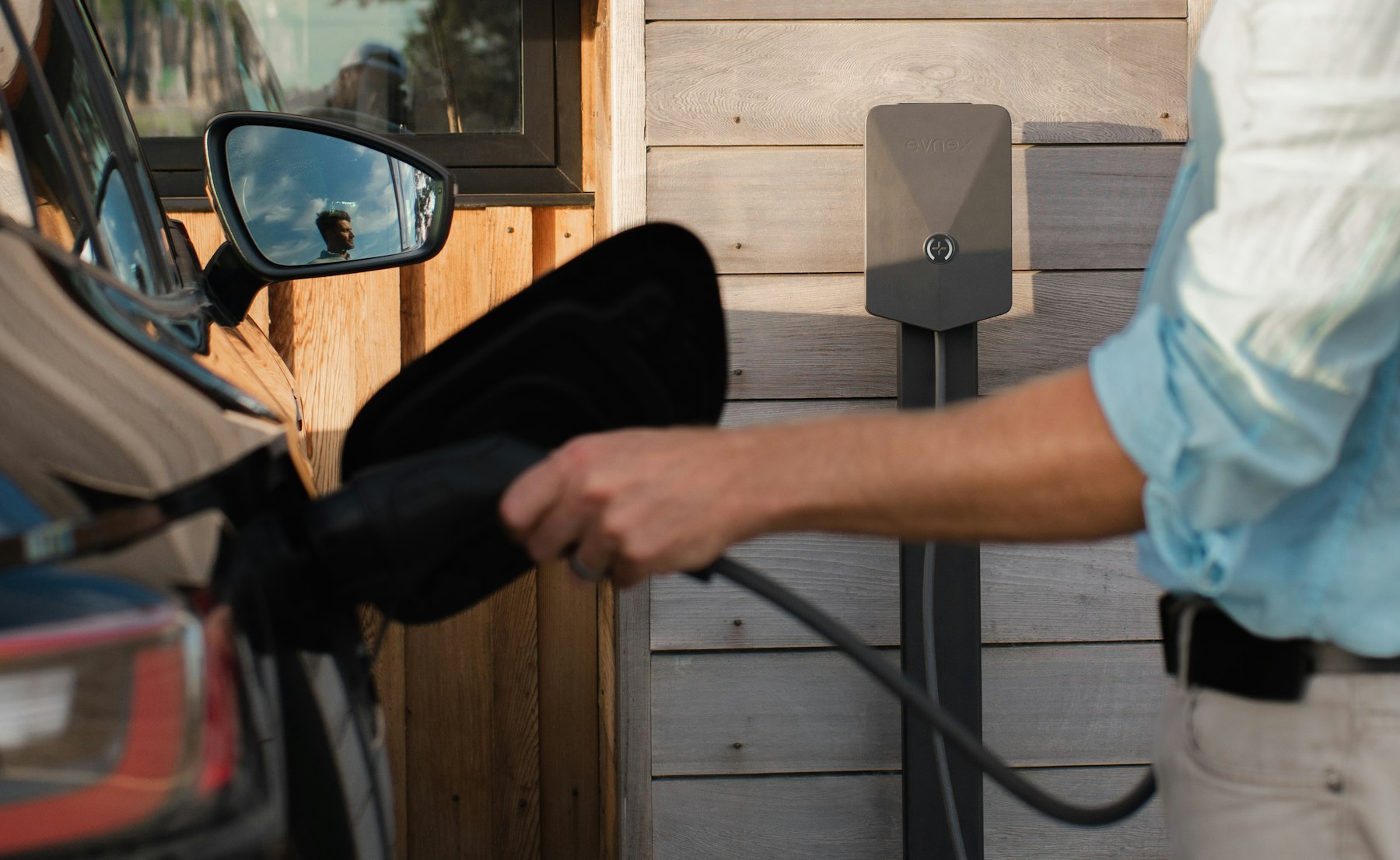 Charging cable connected to a vehicle at a Carlsbad workplace parking stall