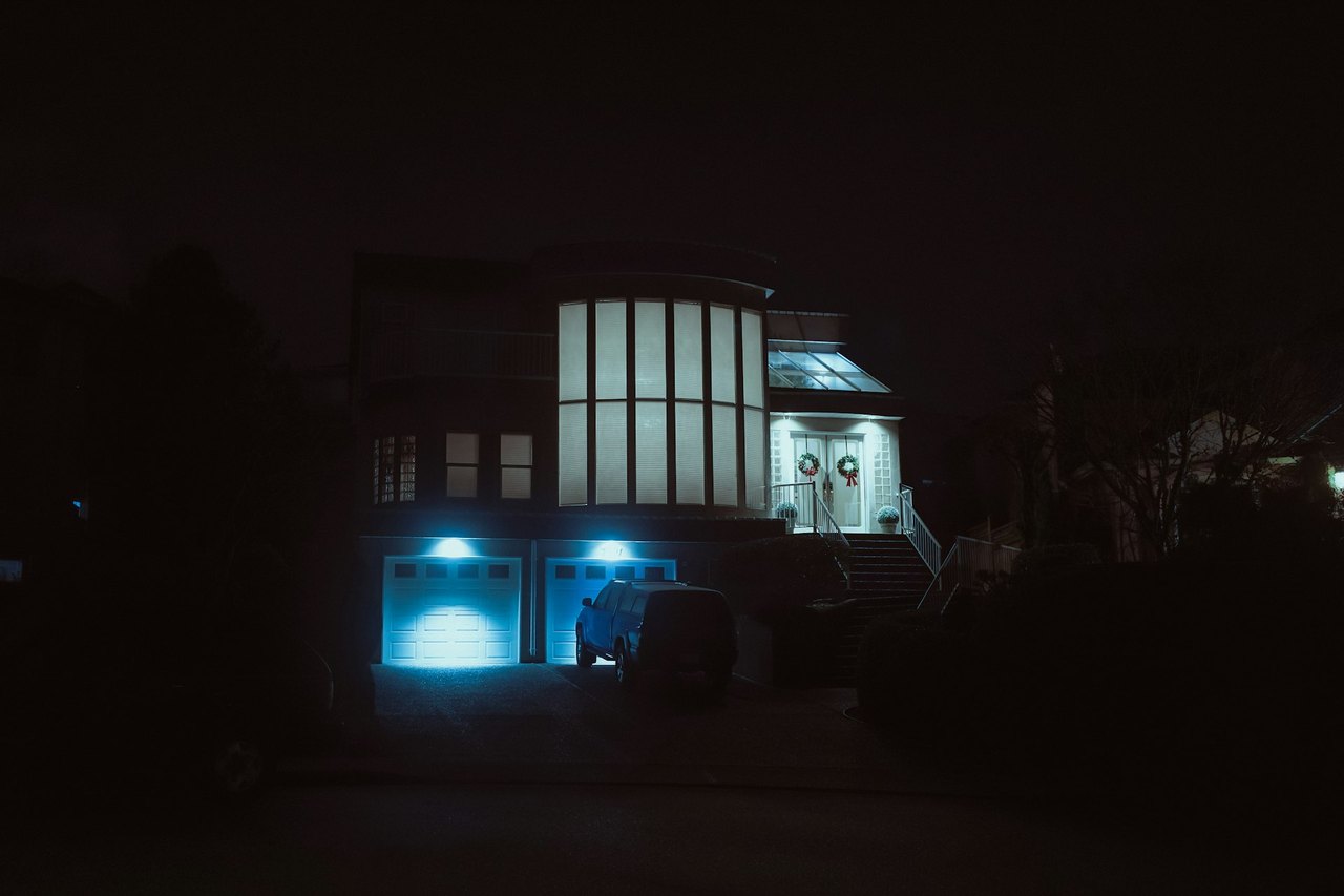 A Hamilton County home with lights on after dark