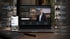 Laptop und Smartphone zeigen eine Immobilien-Website mit Slogan „Immobilien sind Vertrauenssache“ und Kundenbewertungen.