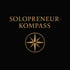 SOLOPRENEUR-KOMPASS goldener Text über einer goldenen Kompassrose auf schwarzem Hintergrund.
