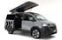 VW Caravelle Campervan mit offenem Aufstelldach von vanexxt