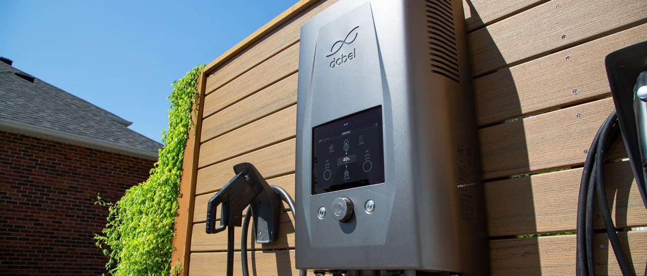 Level 2 EV charger mounted on the exterior wall of a home