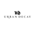 Logo von Urban Decay mit den Buchstaben "UD" und dem Schriftzug "URBAN DECAY" in Schwarz auf grünem Hintergrund.