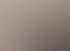 Eine lächelnde Frau und ein Mann stehen vor einem Eingang mit dem Logo von Faszinierend Yvonne Morawitz.
