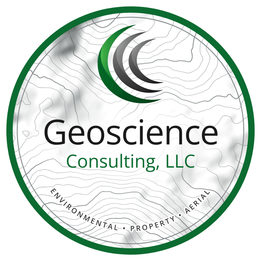Abstract logo consisting of four curved, crescent-shaped swooshes in green and gray on a white background.
