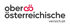 Logo der Oberösterreichischen Versicherung mit rotem Unendlichkeitssymbol auf schwarzem Hintergrund.