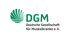 Logo der DGM - Deutsche Gesellschaft für Muskelkranke e.V. mit grünem Kreissymbol auf schwarzem Hintergrund.